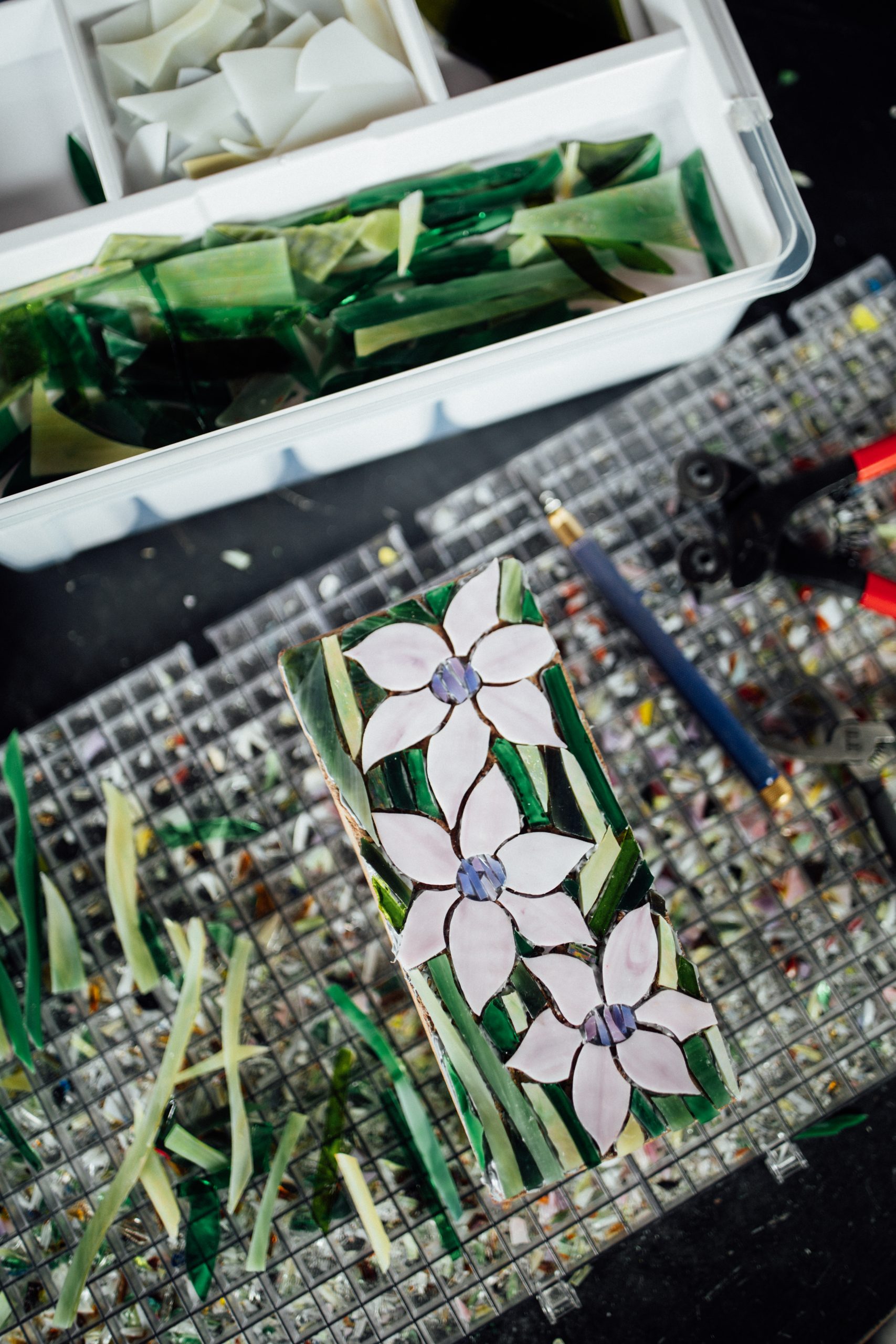 Garden mosaic made from stained glass scraps. 