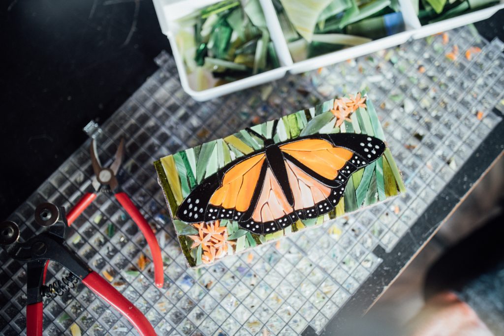 monarch mosaic made from stained glass scraps